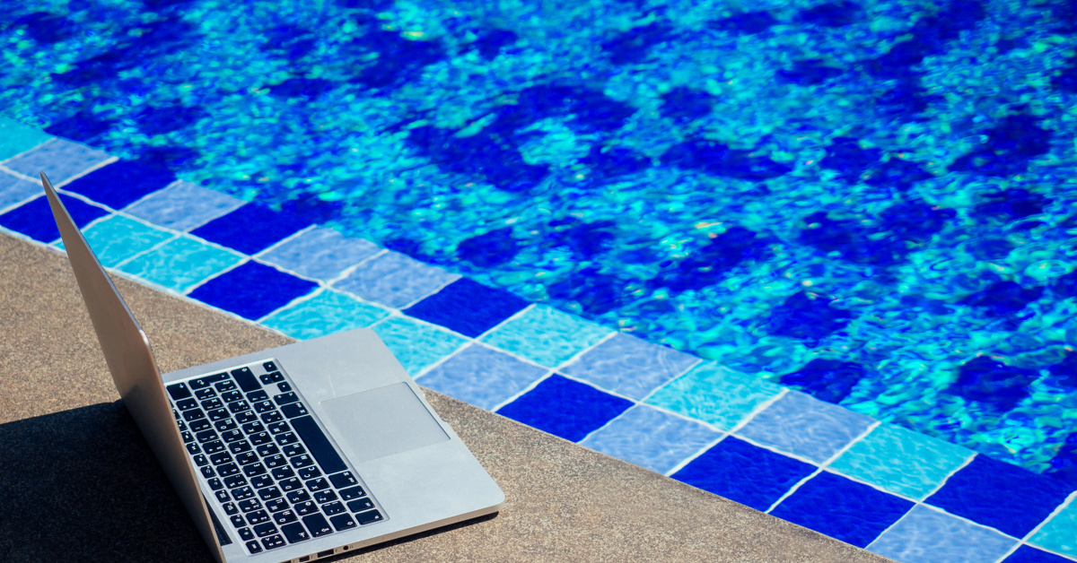 laptop at the pool remote work on holiday freelan 2022 05 31 13 43 30 utc